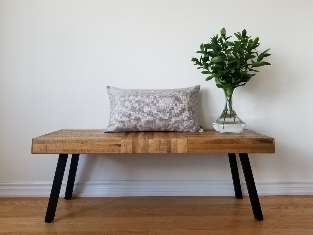 Silver and off-white geometric pillow cover. 14 x 24 inches made of mixed fibers.