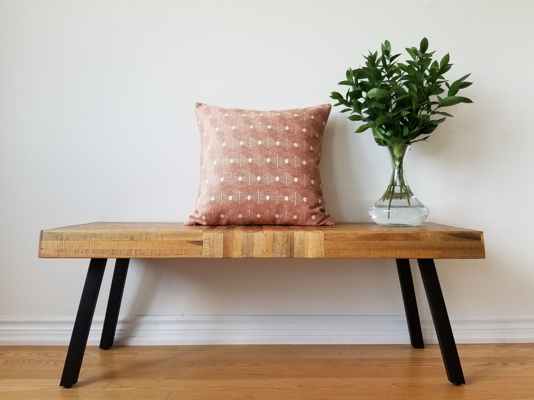 This 20 x 20 pillow cover features rich velvety salmon hexagons wrapped in beige trim to create a geometric gem with two distinct but blended sides. Material is mixed fibers. 