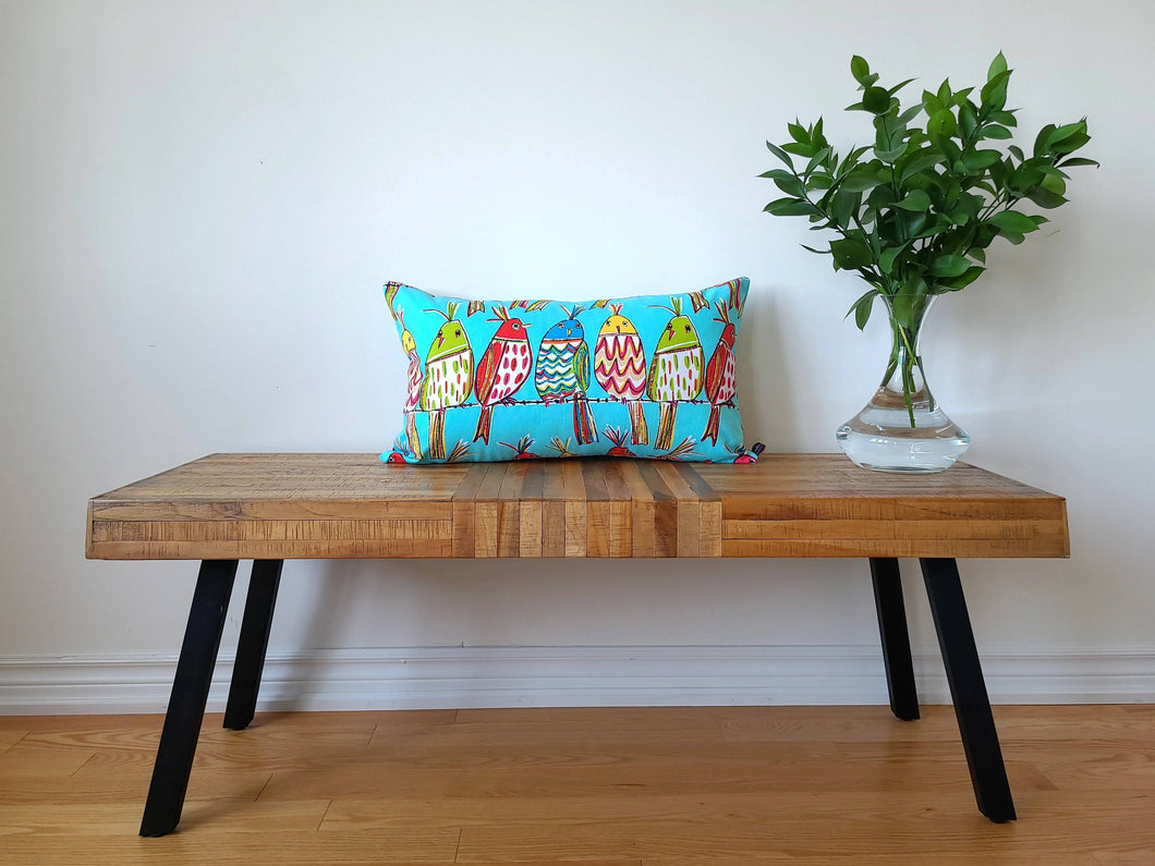 Blue cotton 14 x 24 inch, vibrant pillow cover with multi coloured birds perching on a wire, fun, fresh, and bold.