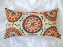 Load image into Gallery viewer, Boho-Retro inspired pillow cover, main colour is cream with beautiful multi-coloured circles (burnt oranges, green, red, tangerine, and turquoise) lined with flowers and stems. 14 x 24 inches made from mixed fibers.
