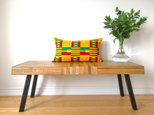 Load image into Gallery viewer, Rich and bold beautiful 14 x 24 inch West African multi coloured Kente pattern pillow.  Boast vibrant colours in various geometric shapes and stripes including gold, green, burgundy, light blue, black and white. This gorgeous pillow is made from 100% cotton.
