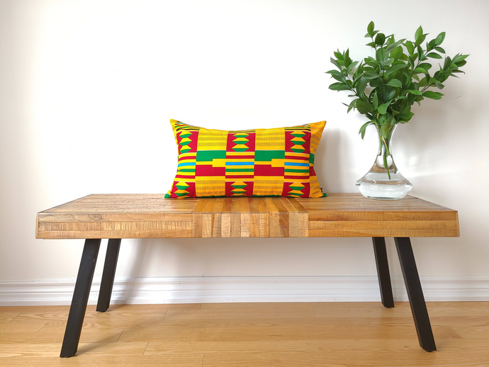 Rich and bold beautiful 14 x 24 inch West African multi coloured Kente pattern pillow.  Boast vibrant colours in various geometric shapes and stripes including gold, green, burgundy, light blue, black and white. This gorgeous pillow is made from 100% cotton.
