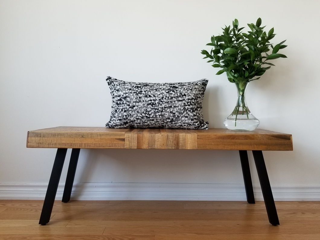 Beautiful and luxurious textured 60% wool pillow cover.  This cover is a blend of black and white woven material that pairs soft and cozy with sophistication. 14 x 24 inches.