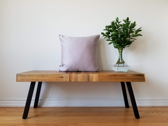 Silver diamond design with hints of pink. Pillow cover has a luminous finish giving it a slight shine. 20 x 20 inches, material is polyester.  