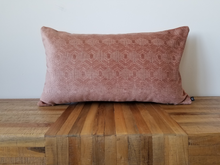 Load image into Gallery viewer, This 14 x 24 pillow cover design features rich velvety salmon hexagons wrapped in beige trim to create a geometric gem with two distinct but blended sides. Material is mixed fibers. 
