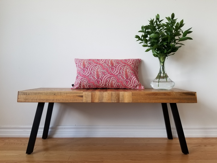 This paisley pink 14 x 24 inch pillow cover is bright and beautiful.  With various shades of pink alongside cream, wine, and grey, its colour can compliment a variety of settings. Material is made of mixed fibers.