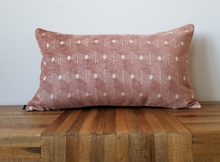 Load image into Gallery viewer, This 14 x 24 pillow cover design features rich velvety salmon hexagons wrapped in beige trim to create a geometric gem with two distinct but blended sides. Material is mixed fibers. 
