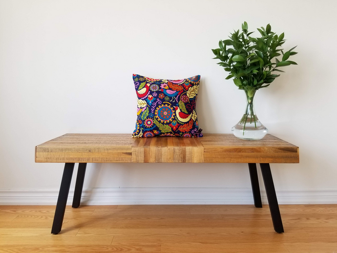 16 x 16 inch navy blue pillow with various vibrant and brightly coloured birds and lush nature. Material is cotton.