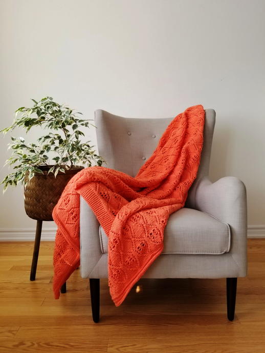 Coral-Orange throw blanket, vibrant colour  and intricate design, 56 x 75