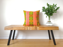 Load image into Gallery viewer, Rich and bold beautiful 20 x 20 inch West African multi coloured Kente pattern pillow. Boast vibrant colours in various geometric shapes and stripes including red, yellow, green, black, white, and gold. This gorgeous pillow is made from 100% cotton.
